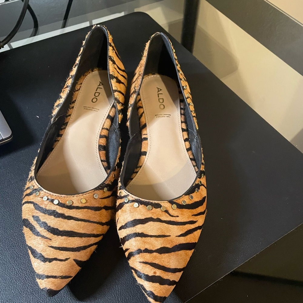 Also tiger print flats